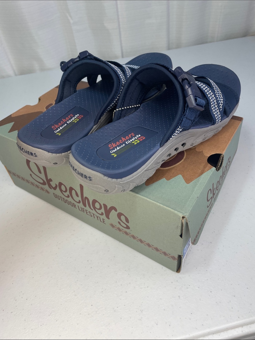 Skechers women’s Navy and White Slip-On Sport Sandals - Picture 3 of 9
